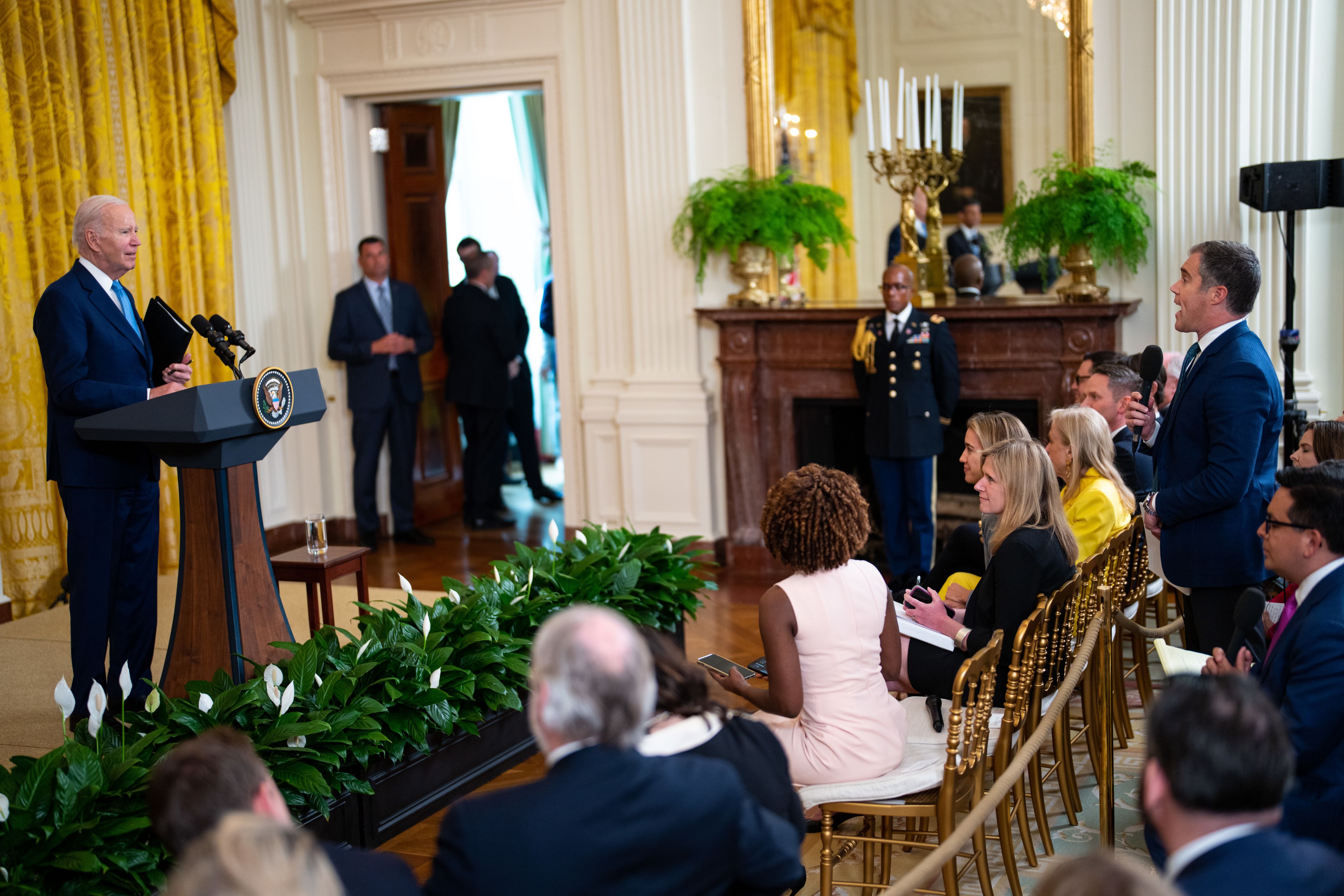 President Biden speaks to reporter Peter Alexander during a press conference